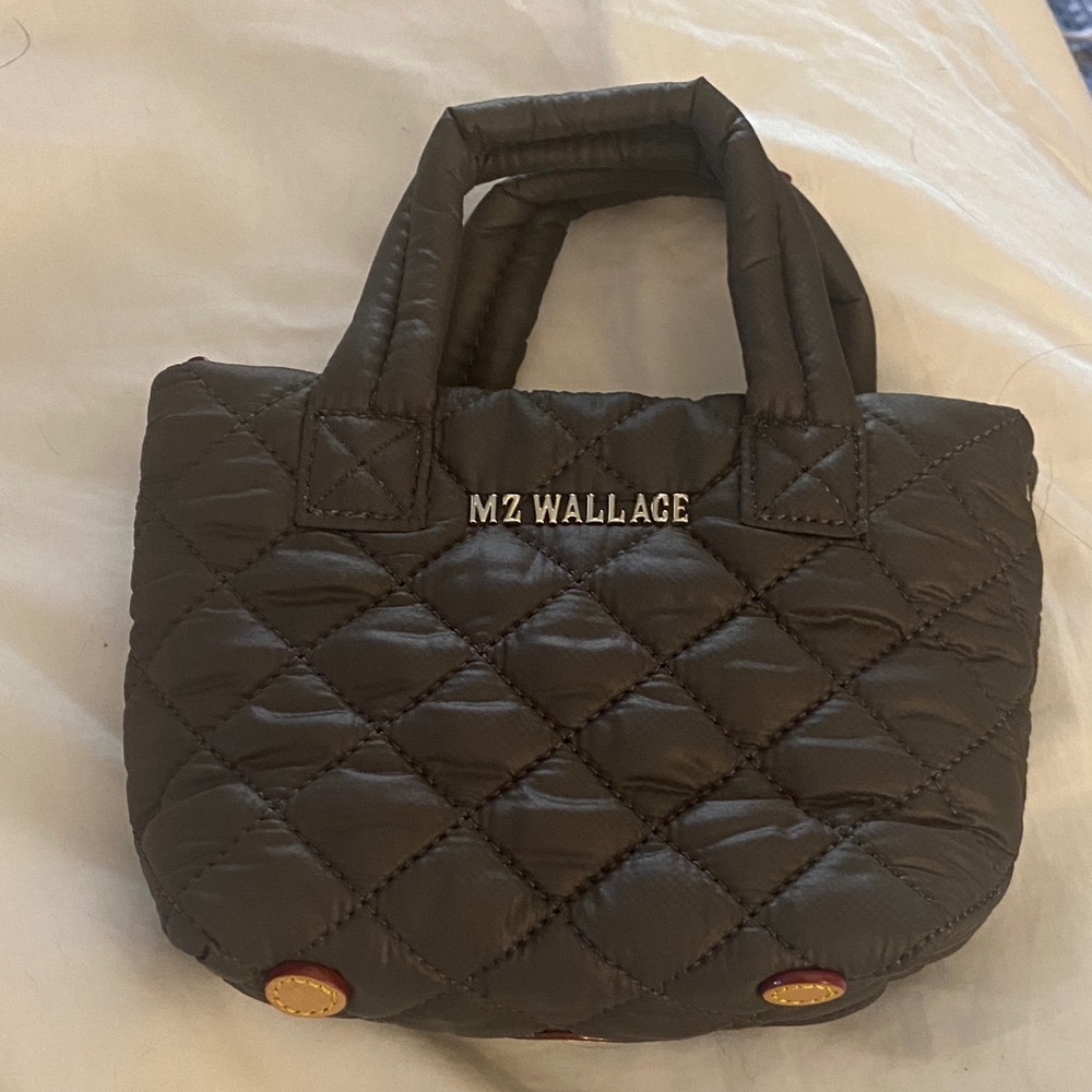 NWT.  MZ Wallace Quilted Mini Bag in Dark blue. Cross body handle included